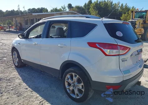 2015 Ford Escape Titanium z USA, uszkodzony, nr VIN 1FMCU9J98FUB79114